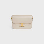 CLASSIQUE TRIOMPHE BAG IN SHINY CALFSKIN LIGHT STONE