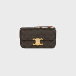 SHOULDER BAG CLAUDE IN TRIOMPHE CANVAS AND CALFSKIN TAN