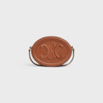CROSSBODY OVAL PURSE CUIR TRIOMPHE IN SMOOTH CALFSKIN TAN