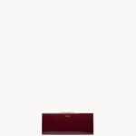 YSL Midnight Small Clutch In Lacquered Leather